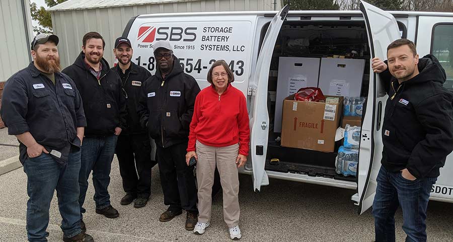 Employee's donating food to local pantry.